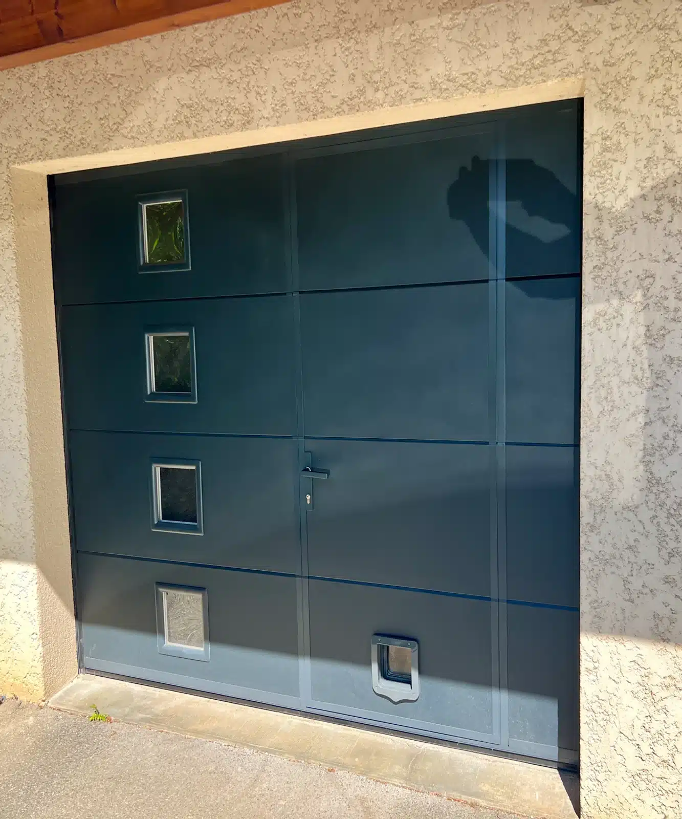 Porte de garage sectionnelle double Fenestram
